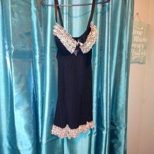 Black babydoll with cheetah print trim.